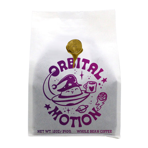 Coffee bag with 'Orbital Motion' branding on a white background