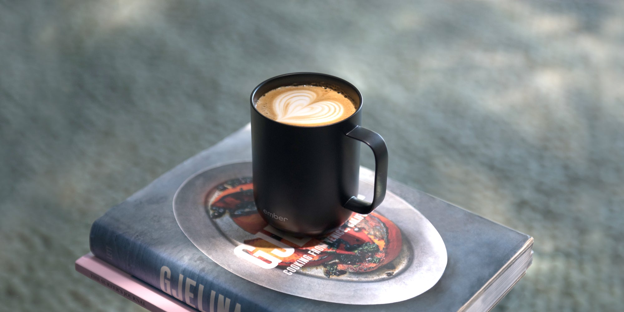 Latte art coffee on wooden table, cozy image for marketing